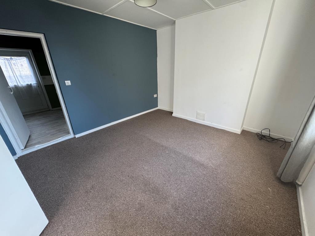 Lot: 75 - END-TERRACE TWO-BEDROOM COTTAGE IN VILLAGE LOCATION - Living room